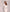 ELAGIA white sweetheart top and midi skirt 2-piece set waist detail view - feminine white suit for women