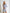 ELAGIA grey one-shoulder fringed mini dress side angle showing asymmetric neckline - 3 piece women's suit
