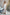 ELAGIA white off-the-shoulder maxi dress front view - elegant 3 piece women's suit alternative for formal wear