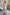 ELAGIA beige off-the-shoulder maxi dress front view - elegant 3 piece women's suit style for business wear
