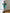 ELAGIA emerald satin puff-sleeve midi dress back view - purple business suit women styling inspiration