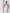ELAGIA White Sweetheart Corset Top worn with accessories - styled white suit for women outfit inspiration