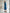ELAGIA navy silk belted midi dress side angle showing purple business suit women silhouette and belt detail