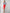 ELAGIA womens red suit set mini skirt detail shot focusing on fabric texture and belt styling