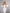 ELAGIA White Satin Puff-Sleeve Midi Dress - movement shot displaying flow and 3 piece women's suit sophistication