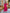 ELAGIA Crimson Puff-Sleeve Midi Dress - back view showing zipper closure and flowing fabric drape on model