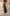 ELAGIA Emerald One-Shoulder Satin Midi Dress - front view showing elegant green satin asymmetrical neckline design
