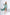 ELAGIA green thigh-slit maxi dress styled with accessories - complete evening look front view