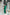 ELAGIA green one-shoulder maxi dress back view showing flowing silhouette - 3 piece women's suit purple business suit women