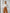 ELAGIA white ribbed-knit wrap crop top styled outfit - womens white suit coordinating piece in casual setting