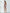 ELAGIA beige one-shoulder feather sleeve mini dress lifestyle shot with purple business suit women aesthetic
