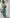 ELAGIA emerald satin wide-leg jumpsuit back view - emerald green jumpsuits showing elegant drape and fit