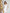 ELAGIA white off-the-shoulder maxi dress worn with statement jewelry - chic purple business suit women option