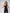 ELAGIA women's black suit set detail shot highlighting V-neck neckline and sleeveless professional jumpsuit design