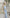 ELAGIA light blue suit women's set back view showing sleeveless top and midi skirt silhouette and fit