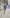 ELAGIA blue one-shoulder mini dress side angle highlighting the modern asymmetrical cut and tailored fit