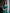 Green Satin Corseted Strapless Dress - side view | ELAGIA