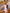 ELAGIA dusty pink strapless v-neck jumpsuit full length styled image - pink suit complete outfit