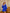 ELAGIA blue backless mini dress hem detail view - 3 piece women's suit purple business suit women silhouette