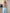 ELAGIA mint strapless v-neck jumpsuit leg detail showing wide-leg cut and blue fabric drape