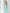 ELAGIA blue jumpsuit detail shot highlighting v-neckline and tailored bodice of mint strapless jumpsuit