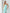 ELAGIA mint jumpsuit styled look showing full-length silhouette and strapless v-neck design in blue