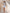 ELAGIA sky-blue one-shoulder satin mini dress - detail shot of hemline and dress silhouette