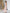 ELAGIA beige off-the-shoulder maxi dress close-up of fabric texture with 3 piece women's suit sophistication