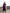 Three-quarter angle of ELAGIA bordeaux double breasted blazer dress trenchcoat showing fit and drape on model