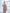 ELAGIA beige one-shoulder feather sleeve mini dress detail shot highlighting 3 piece women's suit tailoring