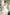 ELAGIA Ivory Sweetheart Peplum Top & Flared Pants 2-Piece Set front view - 3 piece women's suit style