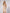 ELAGIA gold one-shoulder satin mini dress styled look with accessories for evening wear