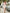 ELAGIA dusty pink midi dress full styling shot with model - modern purple business suit women interpretation