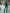 ELAGIA Emerald Regular-Fit 3 piece women's suit - lifestyle shot model wearing purple business suit women's formal attire