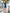 ELAGIA Emerald Silk Long Sleeve Ruched Mini Dress - back view showing purple business suit women styling elements