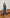 ELAGIA Green-Black Backless Halter Midi Dress back view showing halter tie - purple business suit women twist