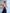 ELAGIA purple business suit women styled look - model wearing black 3 piece suit in office setting