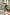 ELAGIA emerald satin puff-sleeve midi dress front view - elegant 3 piece women's suit alternative