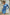 ELAGIA blue one-shoulder mini dress detail shot - 3 piece women's suit styling for purple business suit women fashion