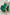 ELAGIA emerald silk maxi dress lifestyle image showcasing 3 piece women's suit elegance in emerald green