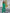 ELAGIA green business suit women's professional wear lifestyle shot showing complete 3 piece suit styling and fit