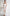 ELAGIA white off-the-shoulder maxi dress lifestyle shot - contemporary 3 piece women's suit inspired piece