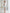 ELAGIA white sweetheart top and midi skirt 2-piece set lifestyle shot - contemporary white suit for women