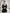 ELAGIA black backless puff sleeve mini dress - side angle showcasing 3 piece women's suit silhouette