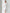 ELAGIA Ivory Square Neck Backless Midi Dress hemline detail showing midi length and dress construction
