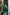 ELAGIA Emerald Satin Cloak Sleeve Mini Dress worn by model in studio - purple business suit women alternative