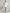 ELAGIA white one-shoulder feather sleeve mini dress - full styling showcase with complete look and fashion presentation