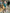 Full-length styled photo of ELAGIA Emerald Satin Long Sleeve Maxi Dress for evening wear