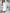 ELAGIA ivory puff-sleeve midi dress back view showing silhouette - 3 piece women's suit purple business suit women