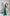 ELAGIA emerald satin wide-leg jumpsuit detail of satin fabric - emerald green jumpsuits material close-up